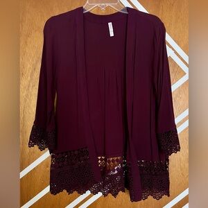 Cardigan with crochet sleeve cuffs and waist